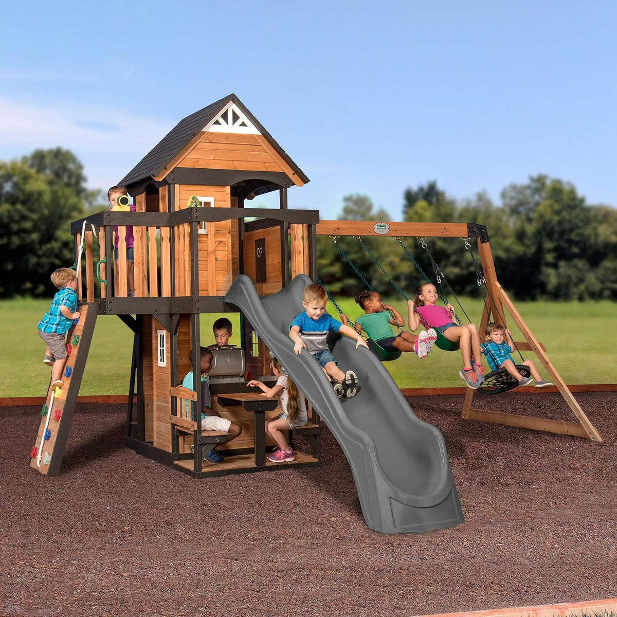 Backyard Discovery Canyon Creek Cedar Wood Swing Set with Wave Slide, Clubhouse, Play Kitchen, Picnic Area, Belt Swings, Web Swing, Rock Wall, Balconies, Playhouse, Step Ladder, Outdoor Playset